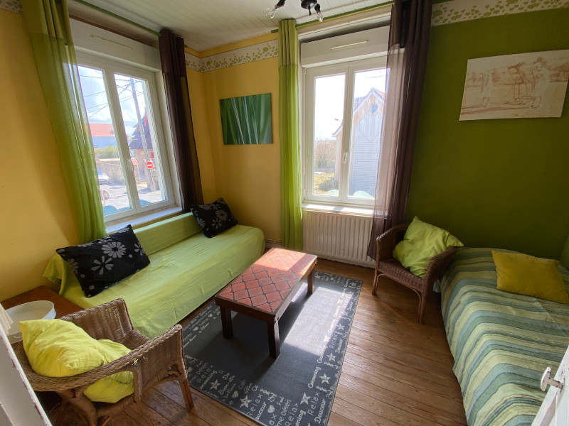 A room : sleeping area with 1 double bed and 1 single bed, television.